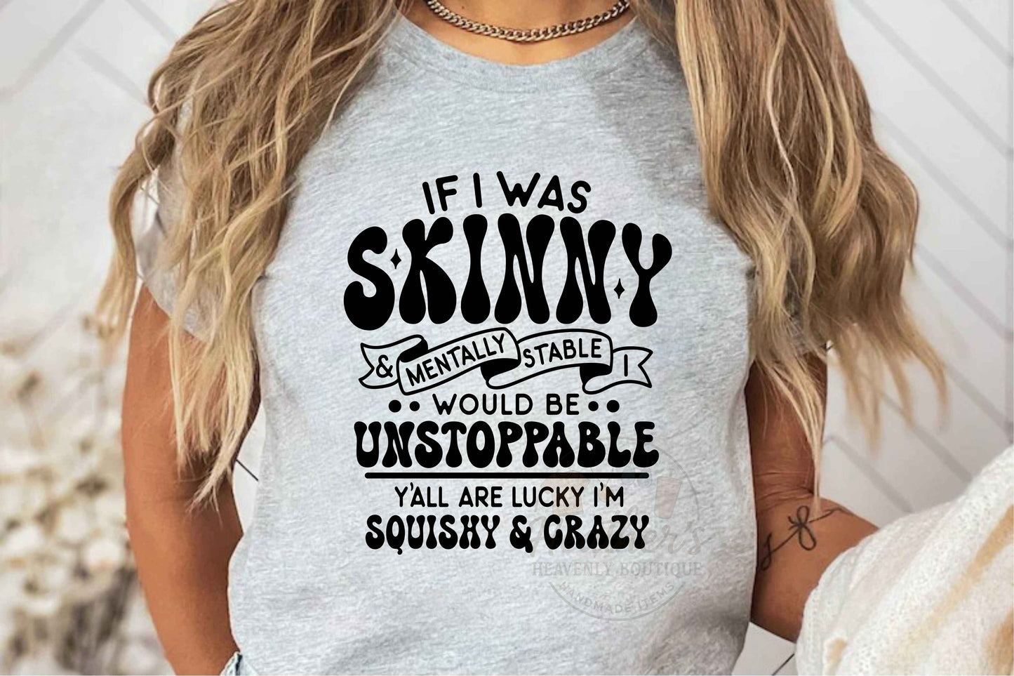 Gray T-shirt with humorous text design worn by a person