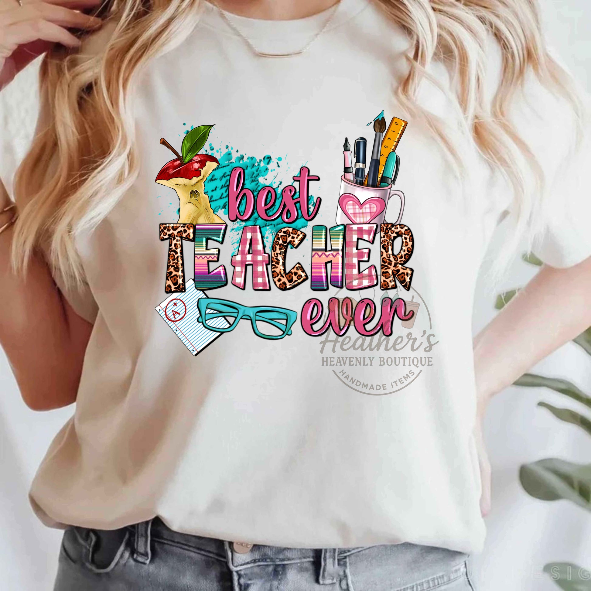 White t-shirt with colorful 'best teacher ever' design and text overlay.