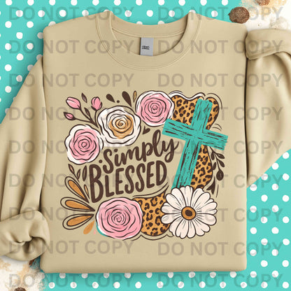 White sweatshirt with bold ‘Simply Blessed’ lettering surrounded by pink roses, daisy, leopard print accents, and distressed turquoise cross – Christian faith crewneck