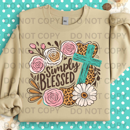 White sweatshirt with bold ‘Simply Blessed’ lettering surrounded by pink roses, daisy, leopard print accents, and distressed turquoise cross – Christian faith crewneck