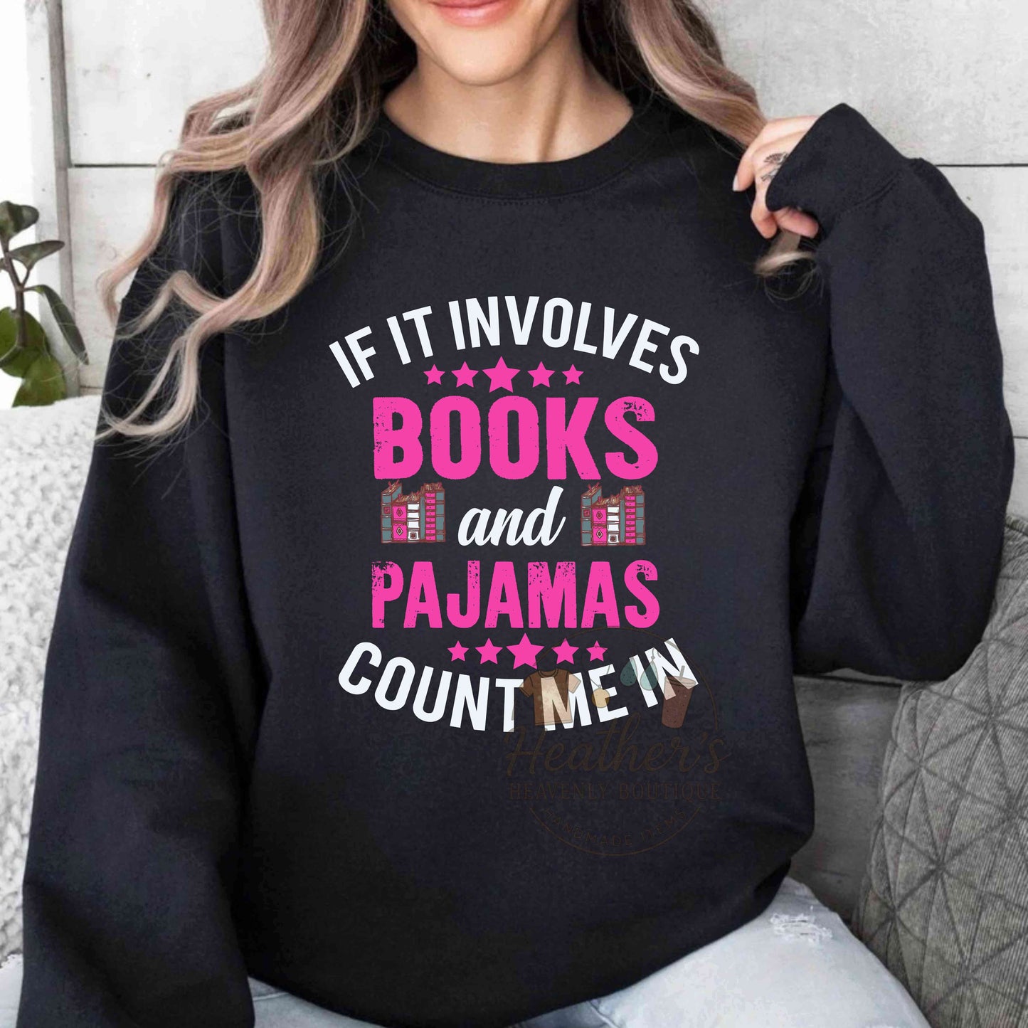 Black sweatshirt that says If it involves books and PJs count me in.